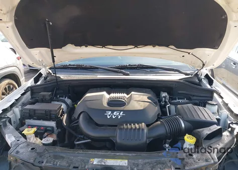 2012 Jeep Grand Cherokee Laredo из США, поврежденный, VIN 1C4RJFAGXCC219599